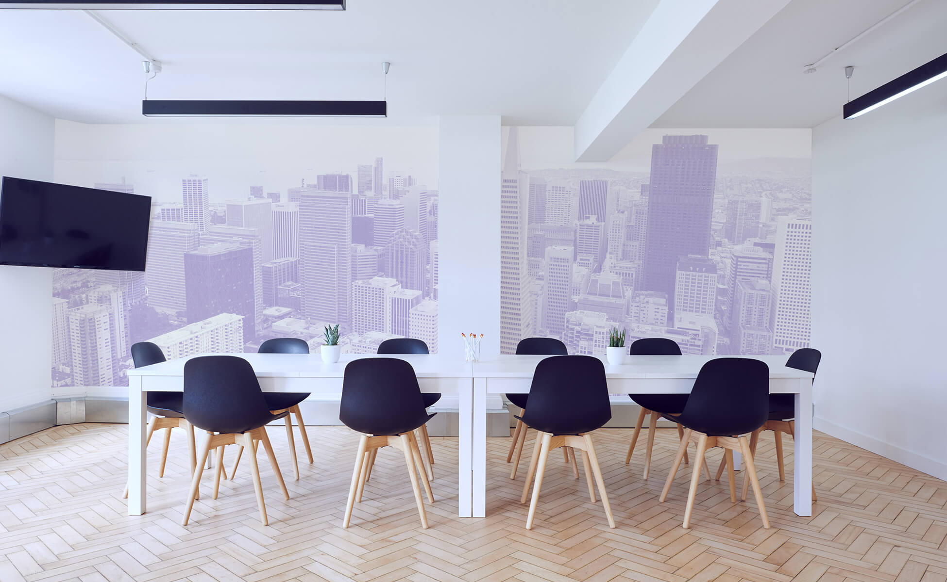 Image of work space with background city wallpaper